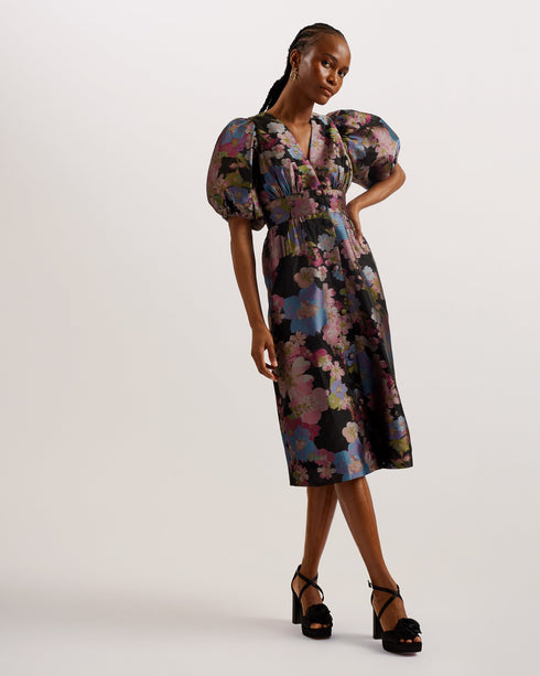 MATSEA-Dresses-MATSEA isn't just a dress, it's a statement. This midi length number comes in a fancy floral jacquard design, crowned with balloon short sleeves for a dose of drama. The low V neckline gives way to button down fastenings that add a sweet finish to this piece. Midi dress Floral jacquard design Button down fastening Balloon short sleeves Low V neckline Fitted waist with pleats Lydia is 5'10" / 1.77m and wears a Ted size 1- Ted Baker Romania